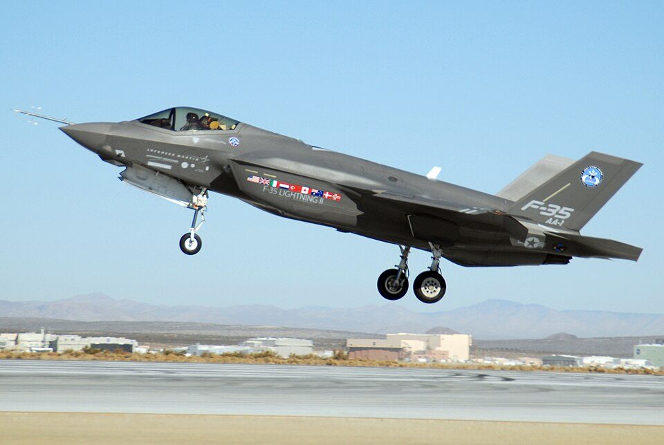 An F-35 Lightning II, marked AA-1, takes off Oct. 23 at Edwards Air Force Base, Calif. The F-35 Integrated Test Force staff concluded an air
