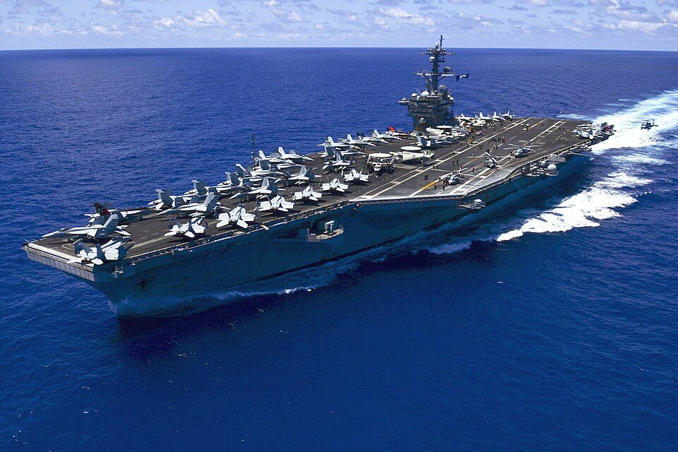 The U.S. Navy aircraft carrier USS Carl Vinson (CVN-70) transits the Pacific Ocean on 31 May 2015. Carl Vinson and its embarked air wing, Ca