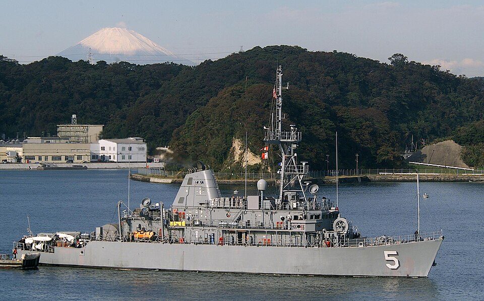 The USS Guardian (MCM-5), a Avenger-class mine countermeasures ship, in November 2002. The USS Guardian is 224 feet in length, has a beam of