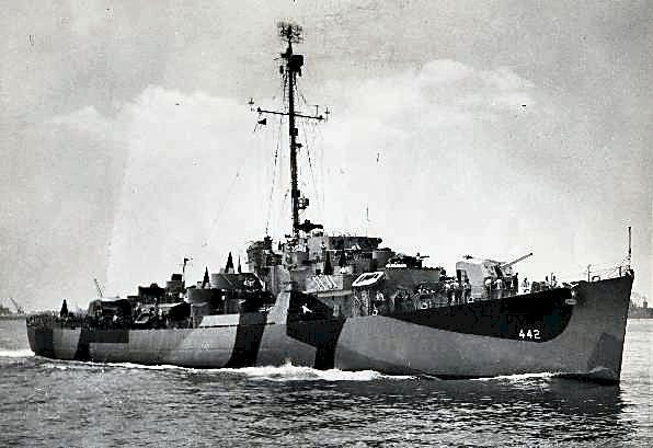 The U.S. Navy destroyer escort USS Ulvert M. Moore (DE-442) being delivered from the Federal Shipbuilding & Drydock Company in Newark, New J